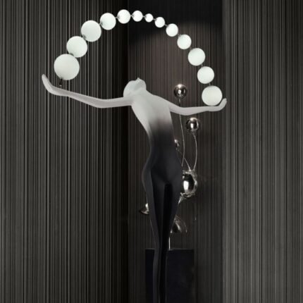 SCULPTURAL FLOOR LAMP FIGURE WITH ARCHING ORBS